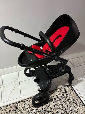 mima stroller with bright red seat insert